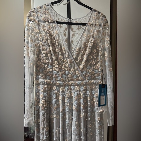 Embellished wrap over illusion long sleeve gown - Picture 7 of 9